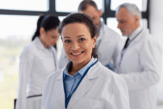 Smiling female doctor representing specialized programs for doctors