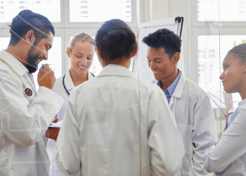 Doctors collaborating during a mentorship session