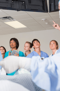 Technician and nurse engaging in a professional development discussion